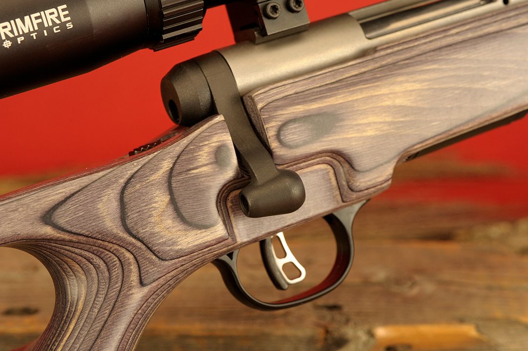 The bolt handle is easy to reach and the bolt knob is tapered. Note how the stock has been relieved for easy access to the bolt. The action is stainless, while the bolt and related parts are blued and the AccuTrigger is standard on this gun.